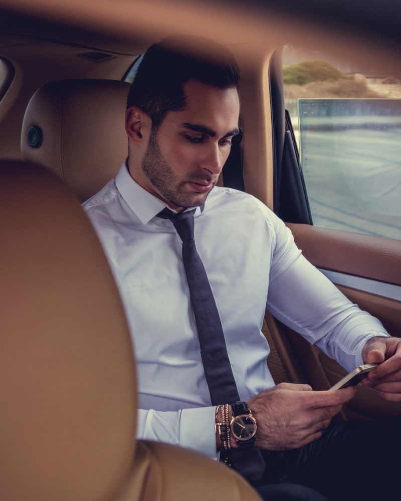 businessman-with-laptop-in-the-car-.jpg